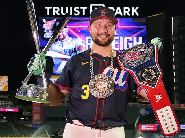 ATLANTA, GEORGIA - JULY 14: Cal Raleigh #29 of the Seattle Mariners poses with the trophy and belt after winning the Home Run Derby at Truist Park on July 14, 2025 in Atlanta, Georgia.