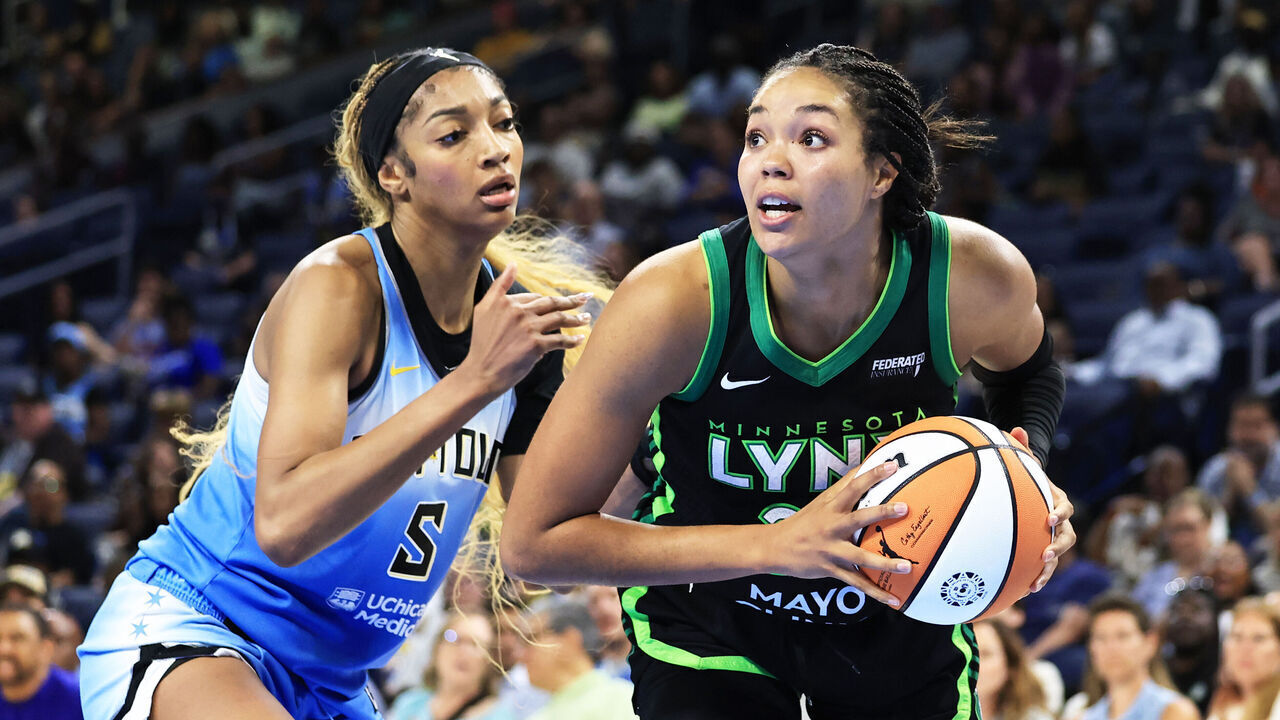 CHICAGO, ILLINOIS - JULY 14: Napheesa Collier #24 of the Minnesota Lynx battles with Angel Reese #5 of the Chicago Sky during the fourth quarter at Wintrust Arena on July 14, 2025 in Chicago, Illinois.
