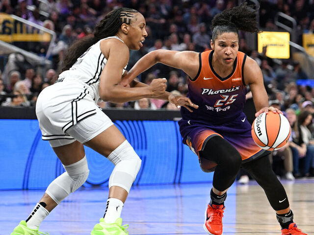 SAN FRANCISCO, CALIFORNIA - JULY 14: Alyssa Thomas #25 of the Phoenix Mercury drives to the basket against Kayla Thornton #5 of the Golden State Valkyries at Chase Center on July 14, 2025 in San Francisco, California.