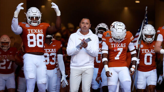 AUSTIN, TEXAS - DECEMBER 21: Head coach Steve Sarkisian of the Texas Longhorns leads the team down the tunnel before the Playoff First Round Game against the Clemson Tigers at Darrell K Royal-Texas Memorial Stadium on December 21, 2024 in Austin, Texas.