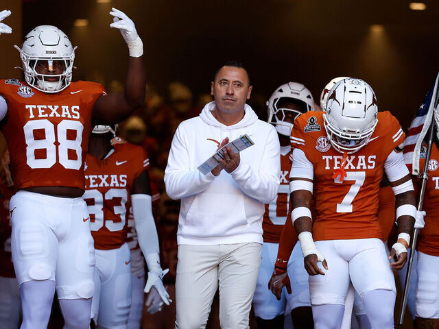 AUSTIN, TEXAS - DECEMBER 21: Head coach Steve Sarkisian of the Texas Longhorns leads the team down the tunnel before the Playoff First Round Game against the Clemson Tigers at Darrell K Royal-Texas Memorial Stadium on December 21, 2024 in Austin, Texas.