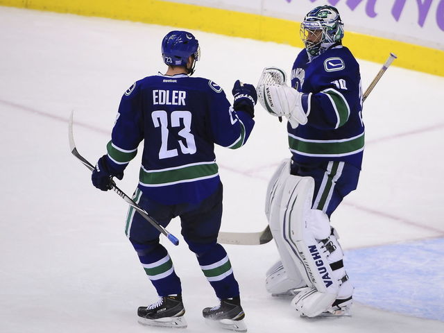 Canucks' Miller records 300th career victory