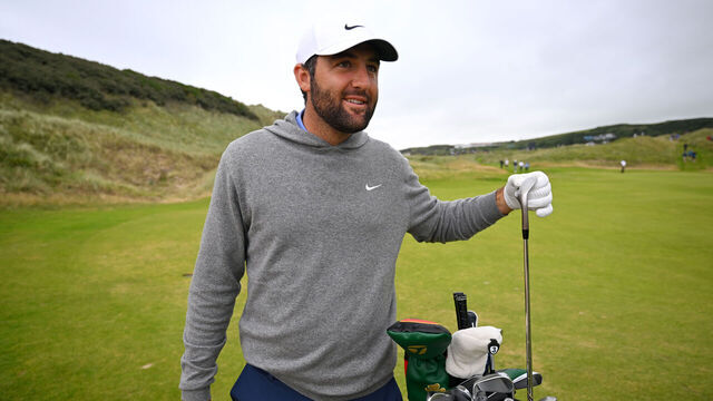 PORTRUSH, NORTHERN IRELAND - JULY 15: Scottie Scheffler of the United States selects a club during a practice round prior to The 153rd Open Championship at Royal Portrush Golf Club on July 15, 2025 in Portrush, Northern Ireland.