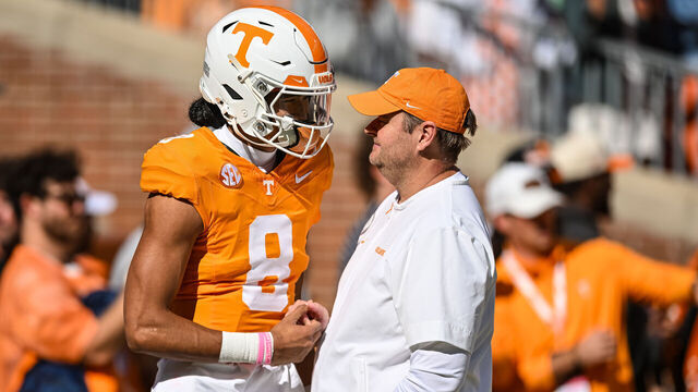 KNOXVILLE, TN - OCTOBER 19: Tennessee Volunteers head coach Josh Heupel talks to Tennessee Volunteers quarterback Nico Iamaleava (8) before the college football game between the Tennessee Volunteers and the Alabama Crimson Tide on October 19, 2024, at Neyland Stadium in Knoxville, TN.