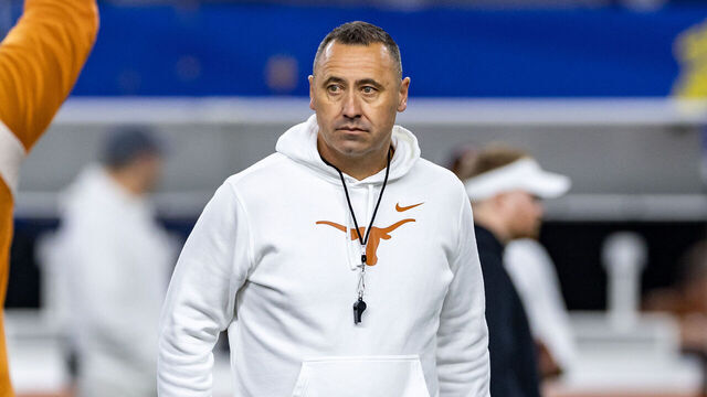 ARLINGTON, TX - JANUARY 10: Texas Longhorns head coach Steve Sarkisian looks on during warm-ups during the CFP Semifinal Cotton Bowl Classic football game between the Ohio State Buckeyes and Texas Longhorns on January 10, 2025 at AT&T Stadium in Arlington, TX.