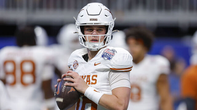 ATLANTA, GEORGIA - JANUARY 1: Arch Manning #16 of the Texas Longhorns warms up prior to the Chick-fil-A Peach Bowl between the Texas Longhorns and Arizona State Sun Devils at Mercedes-Benz Stadium on January 1, 2025 in Atlanta, Georgia.