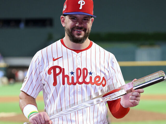 ATLANTA, GEORGIA - JULY 15: Kyle Schwarber #12 of the Philadelphia Phillies celebrates after winning the Most Valuable Player of the MLB All-Star Game at Truist Park on July 15, 2025 in Atlanta, Georgia.