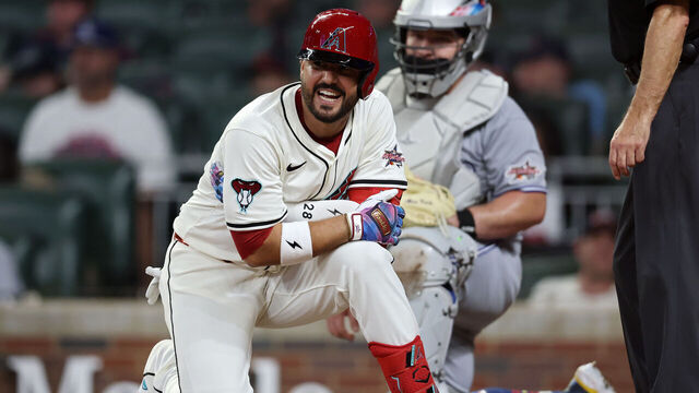 ATLANTA, GEORGIA - JULY 15: Eugenio Suárez #28 of the Arizona Diamondbacks reacts after being hit by a pitch during the eighth inning of the MLB All-Star Game at Truist Park on July 15, 2025 in Atlanta, Georgia.