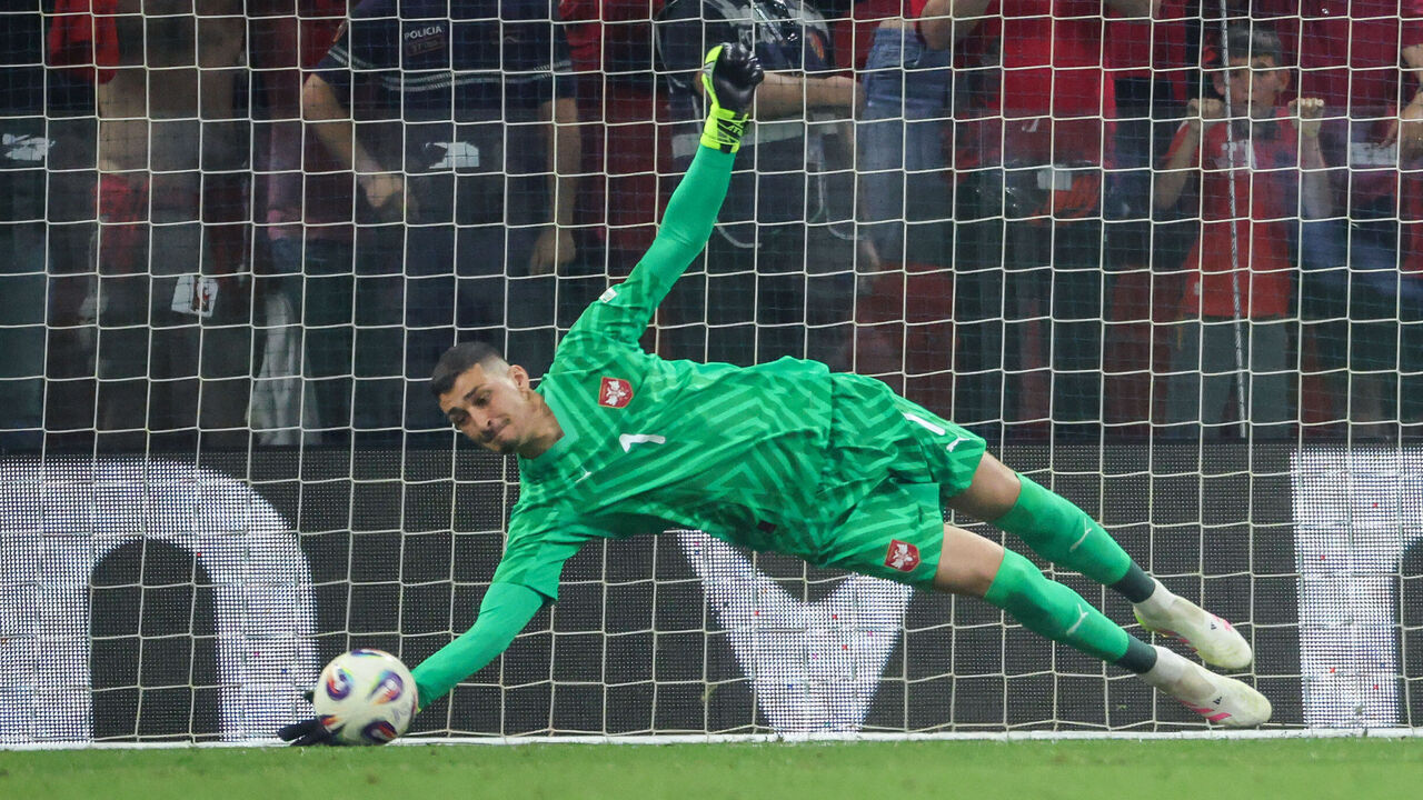 TIRANA, ALBANIA - JUNE 07: Djordje Petrovic of Serbia saves a penalty kick during the FIFA World Cup 2026 European Qualifier between Albania and Serbia on June 07, 2025 in Tirana, Albania.