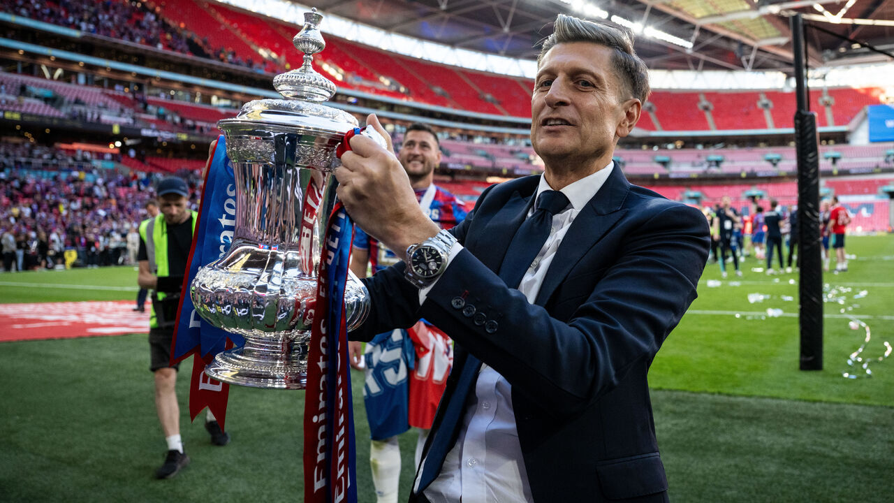 LONDON, ENGLAND - MAY 17: Chairman Steve Parish of Crystal Palace celebrate with a trophy after winning the Emirates FA Cup Final match between Crystal Palace and Manchester City at Wembley Stadium on May 17, 2025 in London, England.