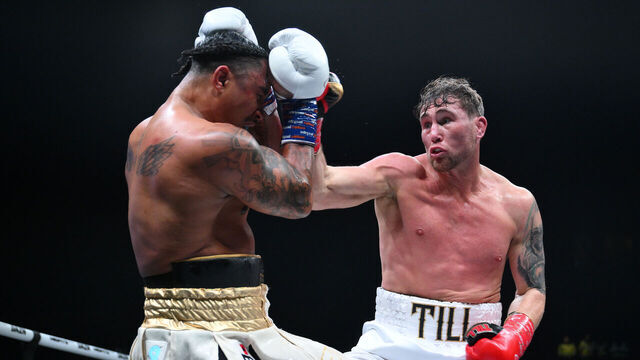 MANCHESTER, ENGLAND - JANUARY 18: Darren Till punches Anthony Taylor during their cruiserweight fight on the Misfits Boxing 30 Live fight card at Co-op Live on January 18, 2025 in Manchester, England.