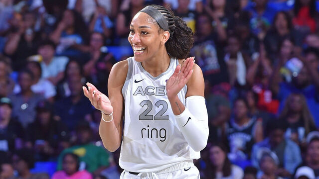 ARLINGTON, TX - JULY 16: A'ja Wilson #22 of the Las Vegas Aces celebrates during the game against the Dallas Wings on July 16, 2025 at the College Park Center in Arlington, TX. Mandatory Copyright Notice: Copyright 2025 NBAE