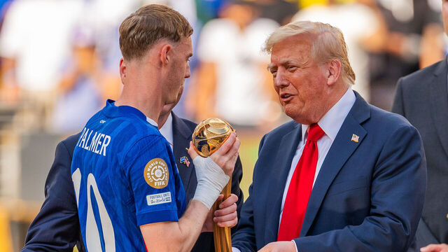 EAST RUTHERFORD, NEW JERSEY - JULY 13: Cole Palmer #10 of Chelsea is presented with an award by U.S. President Donald Trump during the FIFA Club World Cup 2025 final match between Chelsea FC and Paris Saint-Germain at MetLife Stadium on July 13, 2025 in East Rutherford, New Jersey.