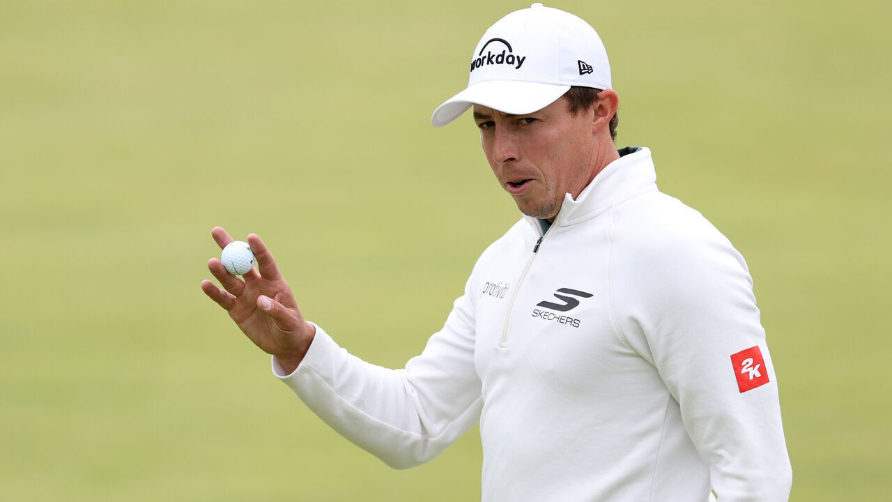 PORTRUSH, NORTHERN IRELAND - JULY 17: Matt Fitzpatrick of England acknowledges the crowd on the 18th green during day one of The 153rd Open Championship at Royal Portrush Golf Club on July 17, 2025 in Portrush, Northern Ireland.