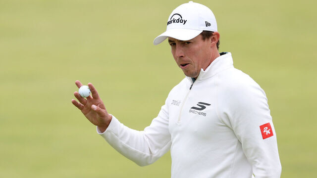 PORTRUSH, NORTHERN IRELAND - JULY 17: Matt Fitzpatrick of England acknowledges the crowd on the 18th green during day one of The 153rd Open Championship at Royal Portrush Golf Club on July 17, 2025 in Portrush, Northern Ireland.
