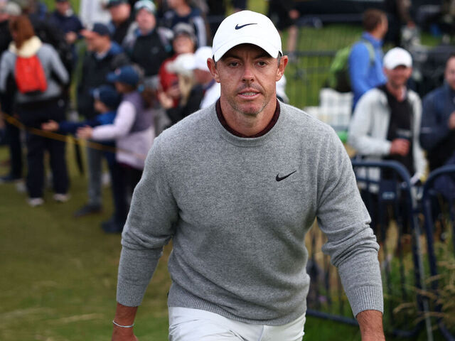 Northern Ireland's Rory McIlroy walks from the 17th green on the opening day of the 153rd Open Championship at Royal Portrush golf club in Northern Ireland on July 17, 2025.