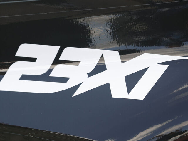 AUSTIN, TX - MARCH 02 a 23XI logo is on the front of Tyler Reddick (#45 23XI Racing The Beast Toyota) during the NASCAR Cup Series Echopark Texas Grand Prix on March 02,2025 at the Circuit of the Americas in Austin, TX.