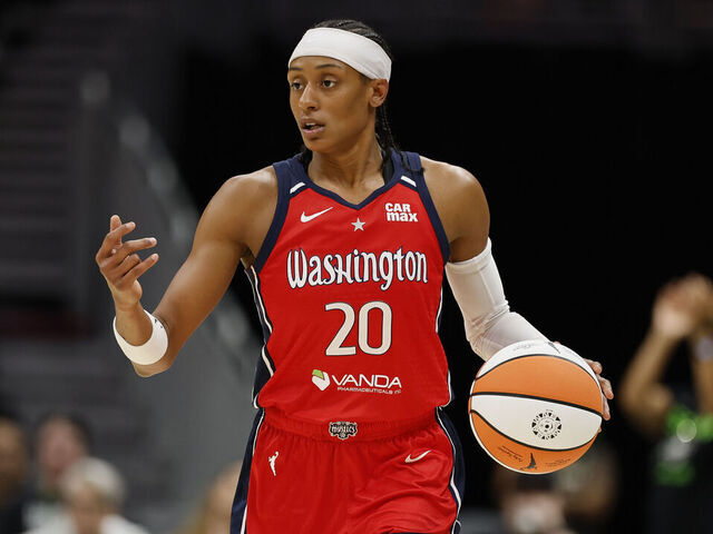 SEATTLE, WASHINGTON - JULY 13: Brittney Sykes #20 of the Washington Mystics controls the ball during the game against the Seattle Storm at Climate Pledge Arena on July 13, 2025 in Seattle, Washington. The Washington Mystics won 74-69.