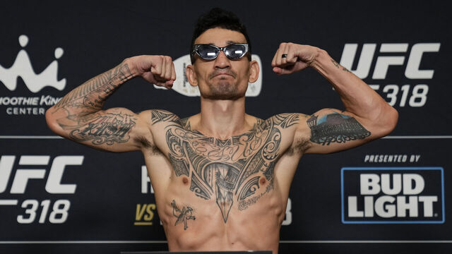 NEW ORLEANS, LOUISIANA - JULY 18: Max Holloway poses on the scale during the UFC 318 official weigh-in at the Royal Sonesta New Orleans on July 18, 2025 in New Orleans, Louisiana.