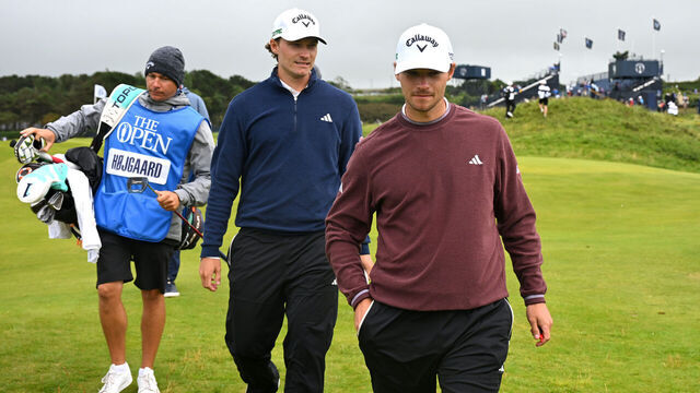 PORTRUSH, NORTHERN IRELAND - JULY 15: Rasmus Hojgaard of Denmark and Nicolai Hojgaard of Denmark walk during a practice round prior to The 153rd Open Championship at Royal Portrush Golf Club on July 15, 2025 in Portrush, Northern Ireland.