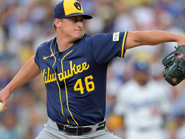 LOS ANGELES, CALIFORNIA - JULY 18: Quinn Priester #46 of the Milwaukee Brewers delivers to the plate in the first inning against the Los Angeles Dodgers at Dodger Stadium on July 18, 2025 in Los Angeles, California.