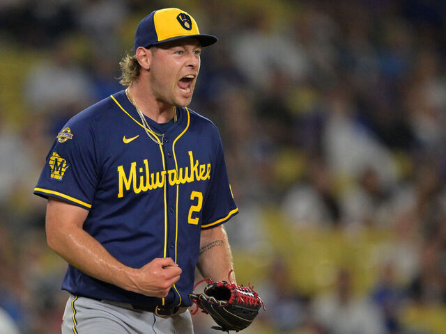LOS ANGELES, CALIFORNIA - JULY 18: Trevor Megill #29 of the Milwaukee Brewers reacts after the final out of the ninth inning, earning a save, against the Los Angeles Dodgers at Dodger Stadium on July 18, 2025 in Los Angeles, California.