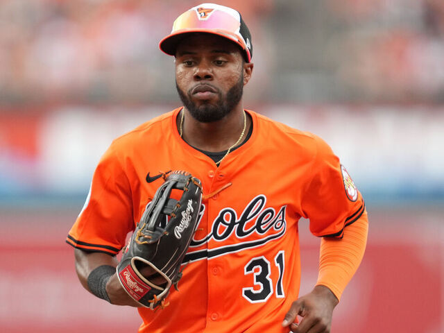 BALTIMORE, MD - JULY 12: Cedric Mullins #31 of the Baltimore Orioles runs to dug out between inning during a baseball game against the Miami Marlins at Oriole Park at Camden Yards on July 12, 2025 in Baltimore, Maryland.