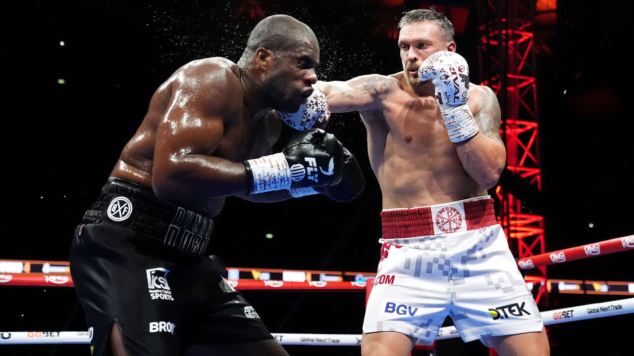 Daniel Dubois (left) and Oleksandr Usyk in action during their IBF, IBO, WBC and WBO World heavyweight bout at Wembley Stadium, London. Picture date: Saturday July 19, 2025.