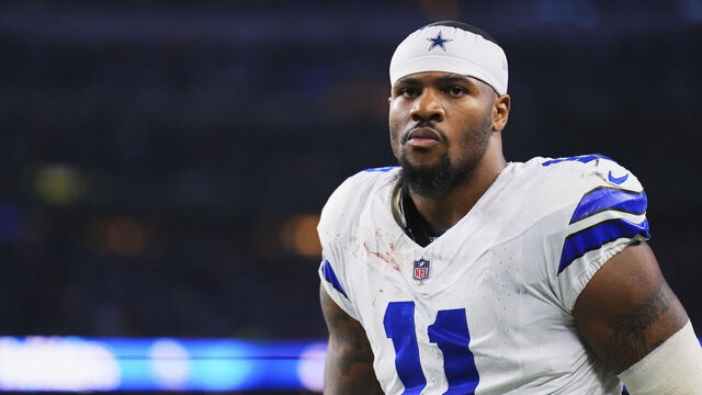 ARLINGTON, TX - DECEMBER 22: Micah Parsons #11 of the Dallas Cowboys walks towards the locker room against the Tampa Bay Buccaneers during an NFL football game at AT&T Stadium on December 22, 2024 in Arlington, Texas.