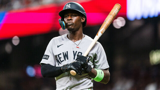 ATLANTA, GA - JULY 19: Jazz Chisholm #13 of the New York Yankees walks off the field in the ninth inning against the Atlanta Braves at Truist Park on July 19, 2025 in Atlanta, Georgia.