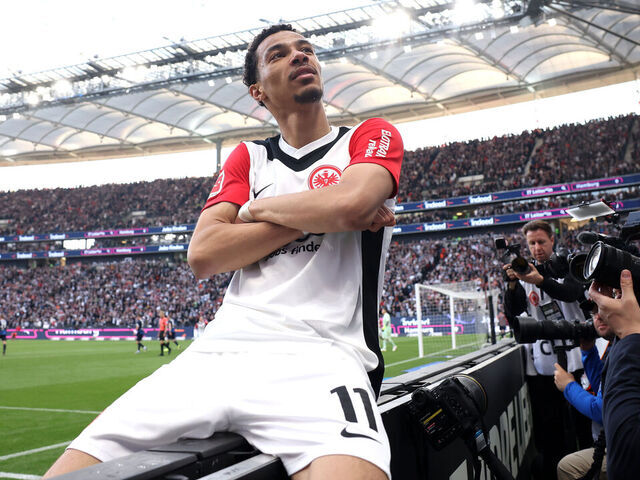 FRANKFURT AM MAIN, GERMANY - APRIL 13: Hugo Ekitike of Eintracht Frankfurt celebrates scoring his team's third goal during the Bundesliga match between Eintracht Frankfurt and 1. FC Heidenheim 1846 at Deutsche Bank Park on April 13, 2025 in Frankfurt am Main, Germany.