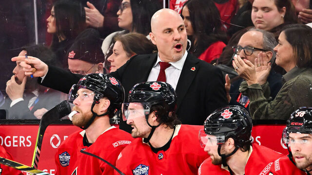 MONTREAL, CANADA - FEBRUARY 15: Assistant coach Rick Tocchet of Team Canada handles the bench during the first period against Team USA in the 2025 NHL 4 Nations Face-Off at the Bell Centre on February 15, 2025 in Montreal, Quebec, Canada. Team USA defeated Team Canada 3-1.