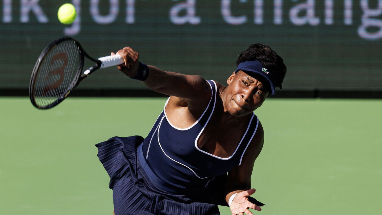INDIAN WELLS, CALIFORNIA - MARCH 07: Venus Williams of the United States serves against Nao Hibino of Japan in the first round of the BNP Paribas Open at Indian Wells Tennis Garden on March 07, 2024 in Indian Wells, California.