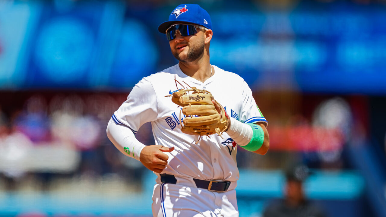 TORONTO, CANADA - JULY 20: Bo Bichette #11 of the Toronto Blue Jays plays the field during their MLB game against the San Francisco Giants at Rogers Centre on July 20, 2025 in Toronto, Canada.