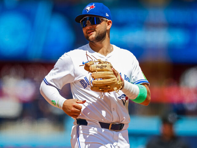 TORONTO, CANADA - JULY 20: Bo Bichette #11 of the Toronto Blue Jays plays the field during their MLB game against the San Francisco Giants at Rogers Centre on July 20, 2025 in Toronto, Canada.