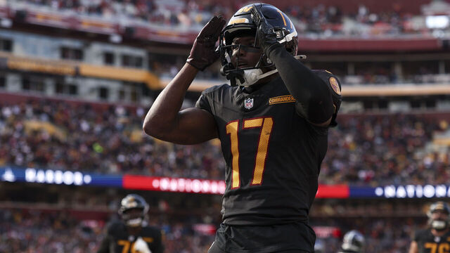 LANDOVER, MARYLAND - DECEMBER 01: Terry McLaurin #17 of the Washington Commanders celebrates a touchdown during a game against the Tennessee Titans at Northwest Stadium on December 01, 2024 in Landover, Maryland. The Commanders defeated the Titans 42-19. (Kara Durrette/Getty Images)