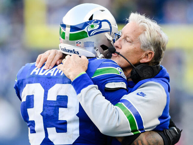 SEATTLE, WASHINGTON - OCTOBER 29: Head Coach Pete Carroll celebrates with Jamal Adams #33 of the Seattle Seahawks during the fourth quarter of the game against the Cleveland Browns at Lumen Field on October 29, 2023 in Seattle, Washington.