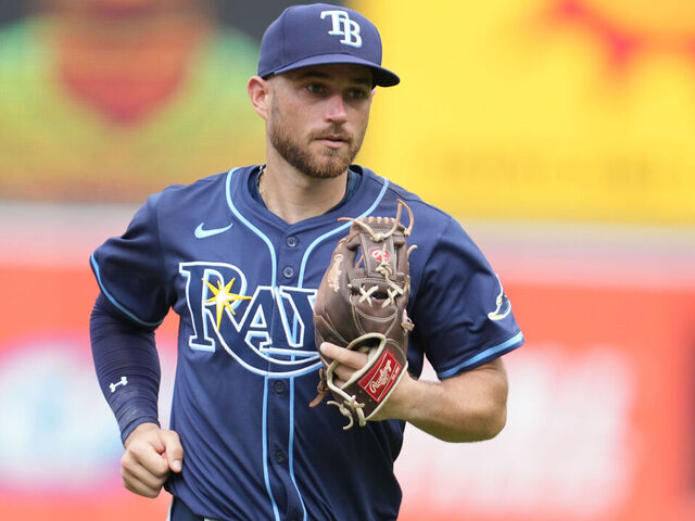 BALTIMORE, MD - JUNE 29: Brandon Lowe #8 of the Tampa Bay Rays runs back to the dugout out between inning during a baseball game against the Baltimore Orioles at Oriole Park at Camden Yards on June 29, 2025 in Baltimore, Maryland.