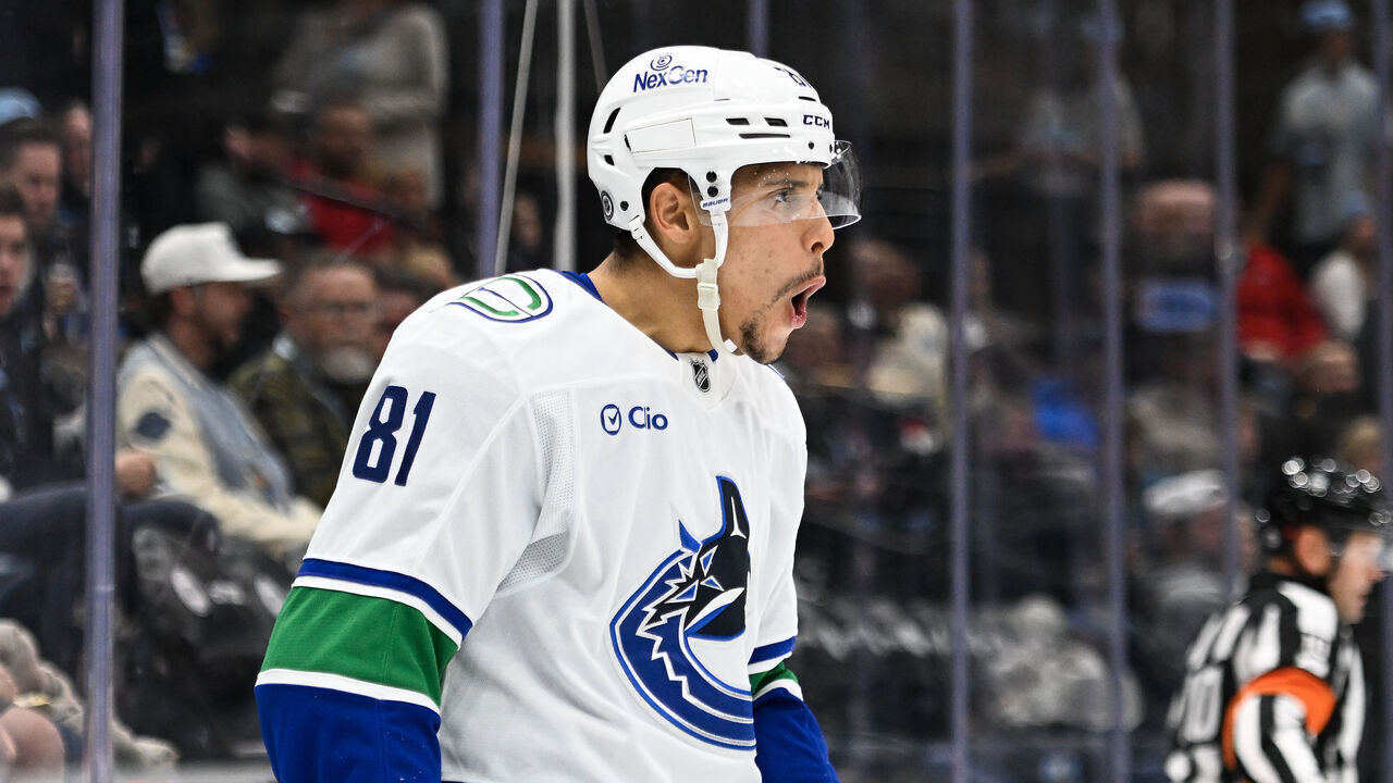 SALT LAKE CITY, UTAH - DECEMBER 18: Dakota Joshua #81 of the Vancouver Canucks celebrates a goal during the third period of a game against the Utah Hockey Club at Delta Center on December 18, 2024 in Salt Lake City, Utah.