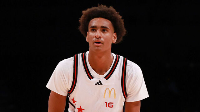 BROOKLYN, NY - APRIL 01: McDonalds High School All American Alijah Arenas (16) shoots a free throw against Darius Adams (20) during the McDonalds Boys High School All American Game on April 1, 2025, at the Barclays Center in Brooklyn, New York.