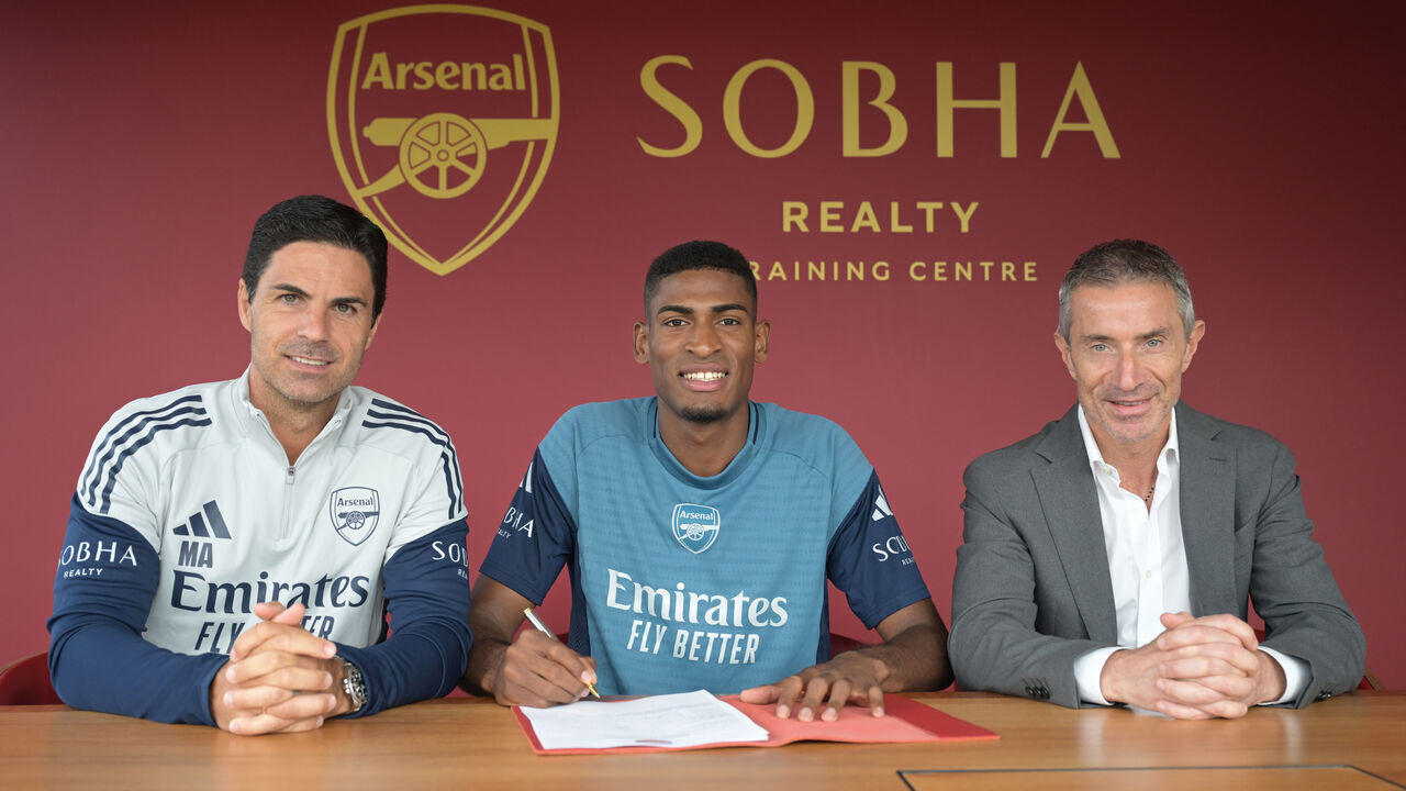 LONDON COLNEY, ENGLAND - JULY 19: (L) Arsenal manager Mikel Arteta with (2ndL) new signing Cristhian Mosquera and (R) Sporting Director Andrea Berta at Sobha Realty Training Centre on July 19, 2025 in London Colney, England.