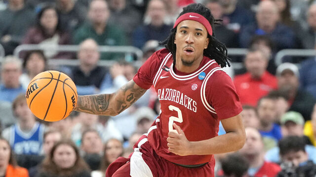 PROVIDENCE, RHODE ISLAND - MARCH 22: Boogie Fland #2 of the Arkansas Razorbacks dribbles up court during a second round game against the St. John's Red Storm in the NCAA Men's Basketball Tournament at Amica Mutual Pavillion on March 22, 2025 in Providence, Rhode Island.