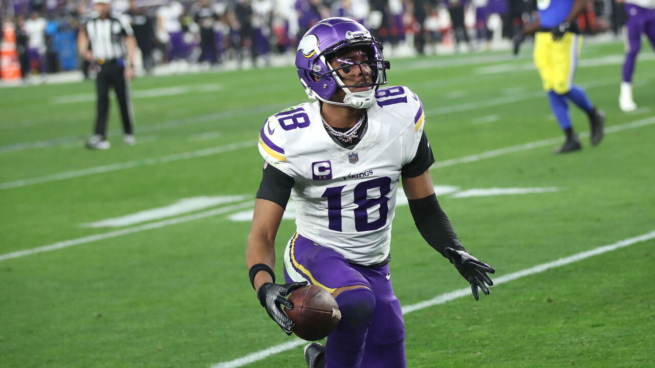 GLENDALE, ARIZONA - JANUARY 13: Wide receiver Justin Jefferson #18 of the Minnesota Vikings makes a catch but is tackled shy of the endzone during a two point conversion in the second half of the Minnesota Vikings versus Los Angeles Rams NFL Wild Card football game at State Farm Stadium on January 13, 2025 in Glendale, Arizona.