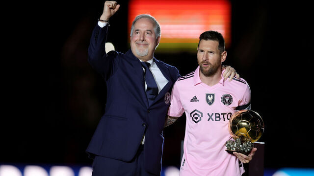 FORT LAUDERDALE, FLORIDA - NOVEMBER 10: Inter Miami CF owners Jorge Mas celebrates with Lionel Messi #10 of Inter Miami CF as he holds his trophy during the Ballon d'Or trophy presentation at DRV PNK Stadium on November 10, 2023 in Fort Lauderdale, Florida.