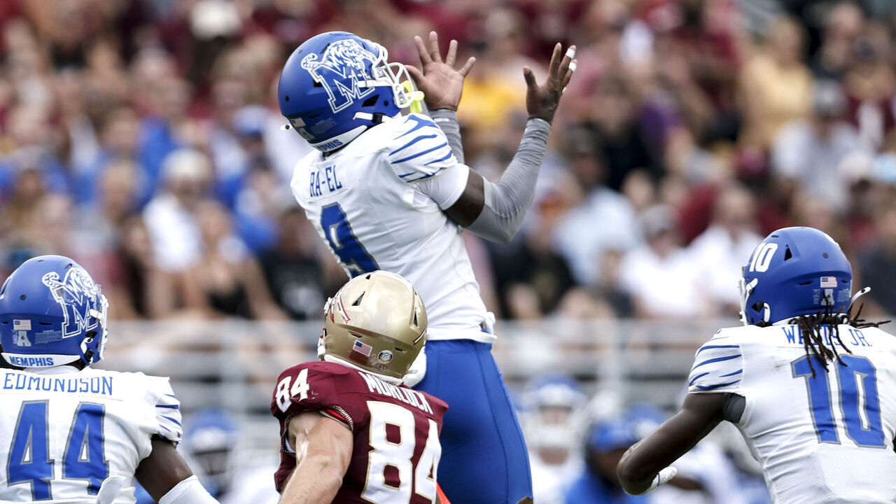 TALLAHASSEE, FL - SEPTEMBER 14: Defensive Back Tahj Ra-El #9 of the Memphis Tigers jumps up to makes an interception on a pass play intended for Tight End Kyle Morlock #84 of the Florida State Seminoles during the game at Doak Campbell Stadium on Bobby Bowden Field on September 14, 2024 in Tallahassee, Florida. The Tigers defeated the Seminoles 20 to 12.