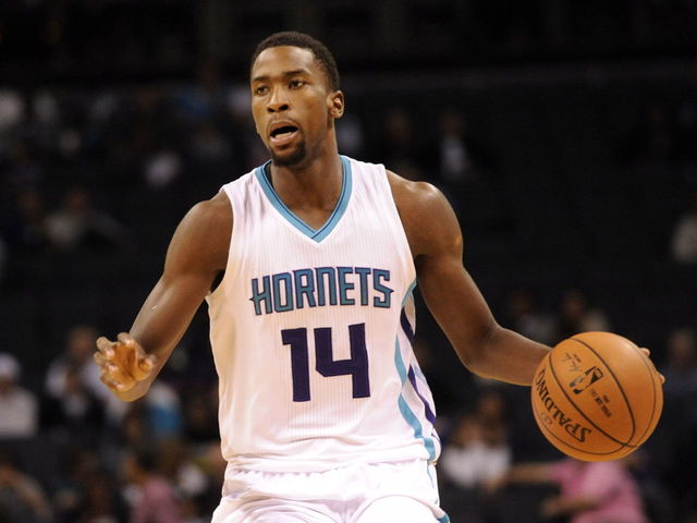 GIF: Michael Kidd-Gilchrist celebrates huge dunk by throwing mouthguard at ref