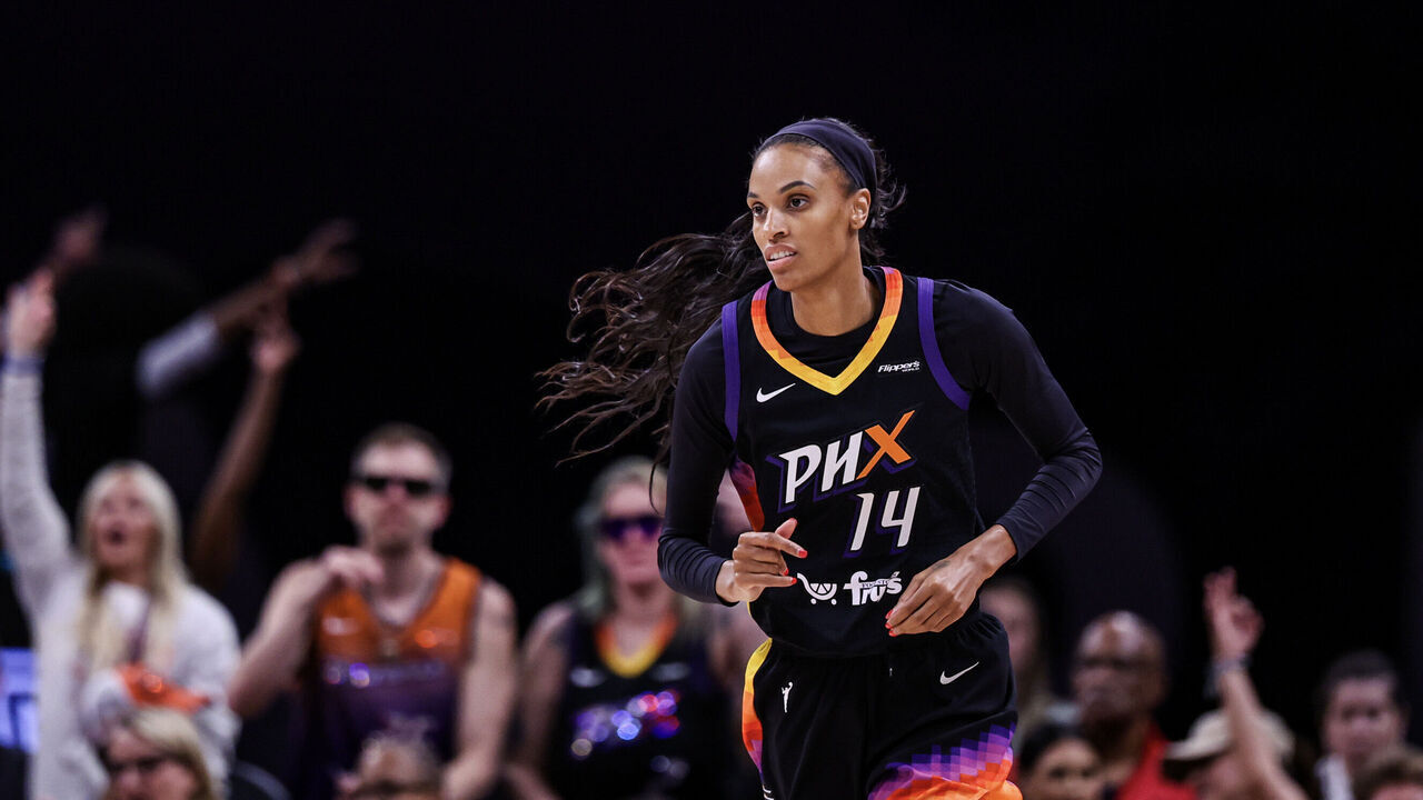 PHOENIX, ARIZONA - JULY 23: DeWanna Bonner #14 of the Phoenix Mercury runs down the court after she makes a three pointer against the Atlanta Dream during the fourth quarter at PHX Arena on July 23, 2025 in Phoenix, Arizona.