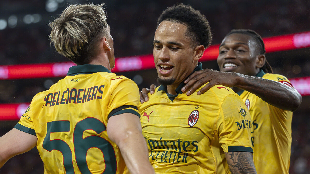 HONG KONG, CHINA - JULY 26: Noah Okafor of AC Milan (C) celebrates after scoring his goal with Alexis Saelemaekers of AC Milan (L) and Rafael Leao of AC Milan (R) during the Liverpool FC v AC Milan Pre-Season Friendly match at Kai Tak Stadium on July 26, 2025 in Hong Kong, China.