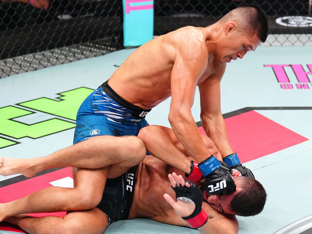 ABU DHABI, UNITED ARAB EMIRATES - JULY 26: (L-R) Steven Nguyen punches Mohammad Yahya of the United Arab Emirates in a featherweight fight during the UFC Fight Night event at Etihad Arena on July 26, 2025 in Abu Dhabi, United Arab Emirates.