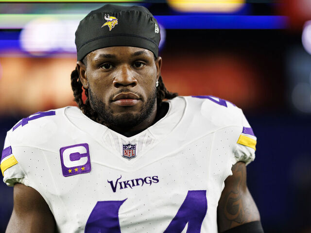 GLENDALE, ARIZONA - JANUARY 13: Safety Josh Metellus #44 of the Minnesota Vikings stands on the field prior to an NFC Wild Card game against the Los Angeles Rams, at State Farm Stadium on January 13, 2025 in Glendale, Arizona.